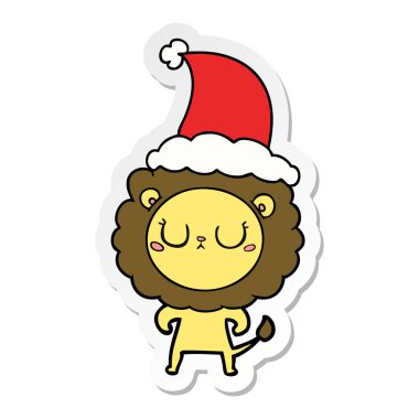 etiket karikatür Noel Baba şapkası giyen aslan el çekilmiş