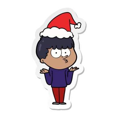 Noel Baba şapkası giyen omuz shrugging meraklı bir çocuk çizilmiş etiket karikatür el