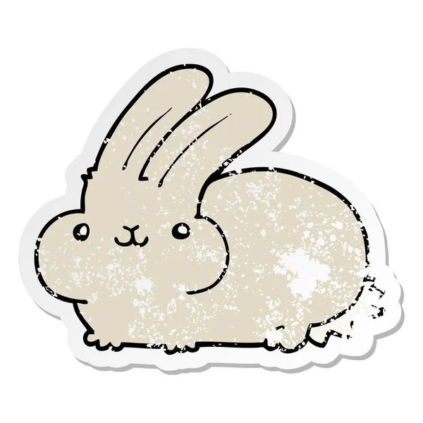 Verontruste sticker van een cartoon konijn — Stockvector