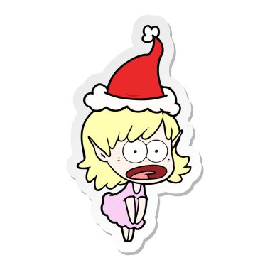 etiket karikatür Noel Baba şapkası giyen bir şok elf kızın el çekilmiş