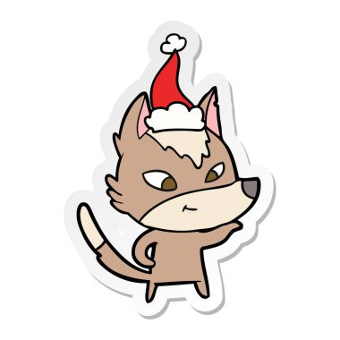 etiket karikatür Noel Baba şapkası giyen bir kurt dostu el çekilmiş