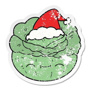 bir lahana giyen Santa şapka el çizilmiş sıkıntılı Sticker karikatür