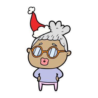 çizim için Noel Baba şapkası giyen gözlük takan bir kütüphaneci kadının el çekilmiş