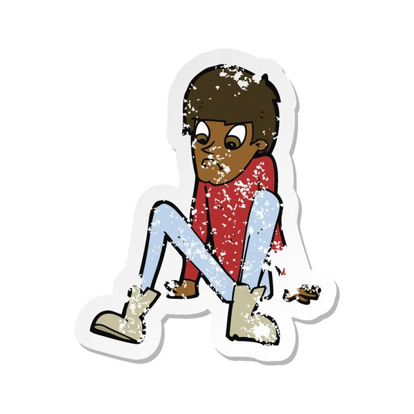 Retro distressed sticker of a cartoon boy sitting on floor — Stock Vector