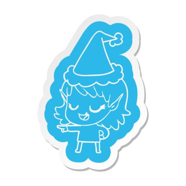 giyen Noel Baba şapkası işaret eden bir elf kızın mutlu ilginç çizgi film etiketi