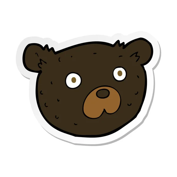 Sticker of a cartoon black bear — Stock Vector