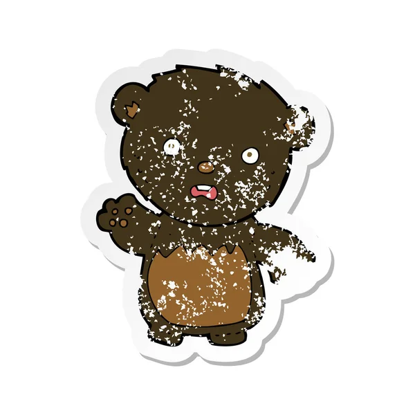 Retro distressed sticker of a cartoon worried black bear — Stock Vector