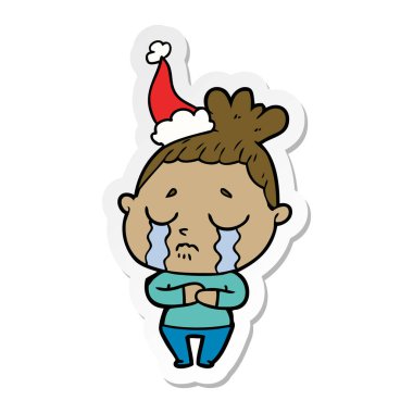 etiket karikatür Noel Baba şapkası giyen bir ağlayan kadının el çekilmiş