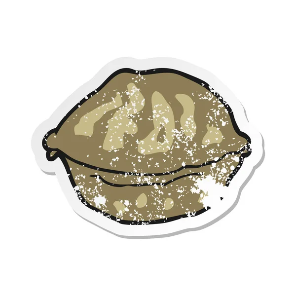 Retro distressed sticker of a cartoon walnut in shell — Stock Vector