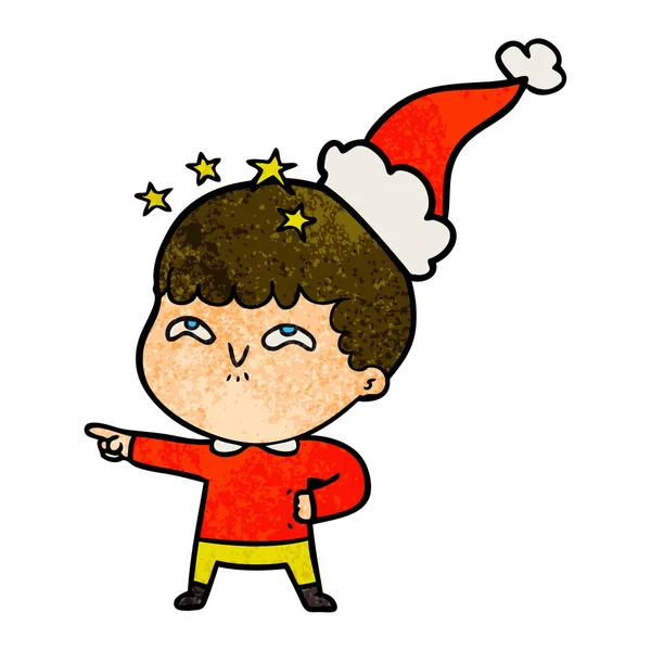 Noel Baba şapkası giyen bir hayran çocuğun dokulu çizgi film el çekilmiş