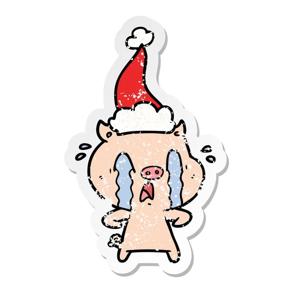 Crying Pig Hand Drawn Distressed Sticker Cartoon Wearing Santa Hat — Stock Vector