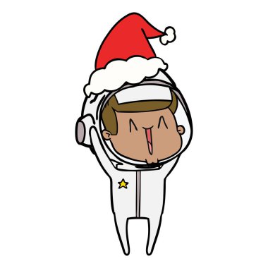 Noel Baba şapkası giyen bir astronotun mutlu çizgi çizme