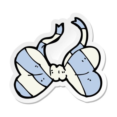 bir çizgi film şeritli papyon etiket