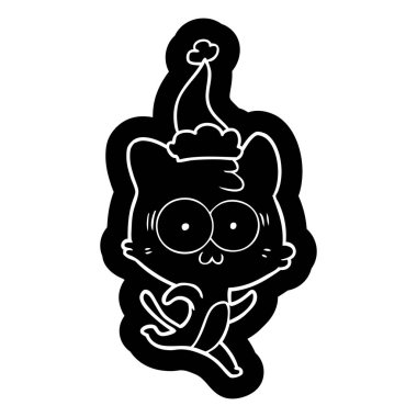 ilginç çizgi film simgesi giyen Noel Baba şapkası çalıştıran bir sürpriz kedi