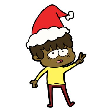 çizim için Noel Baba şapkası giyen yorgun bir çocuk el çekilmiş