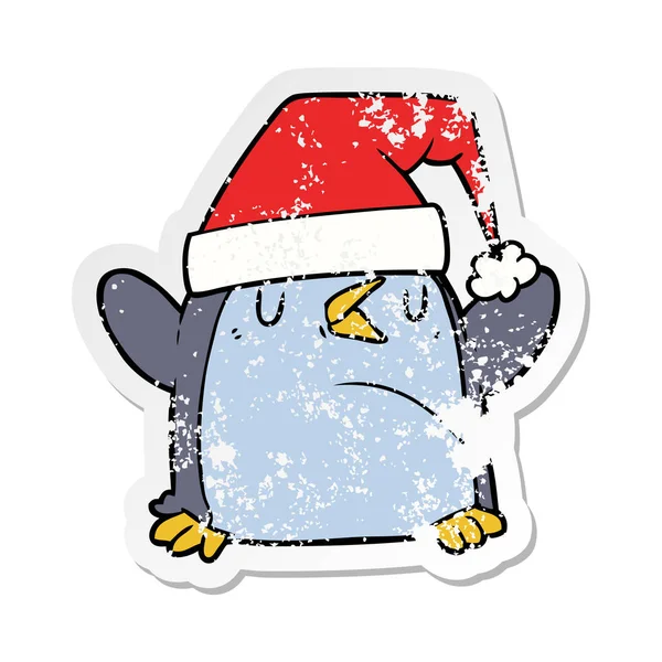 Distressed Sticker Cartoon Penguin Wearing Christmas Hat — Stock Vector