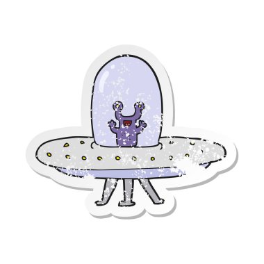 Retro sıkıntılı etiket bir karikatür uçan daire