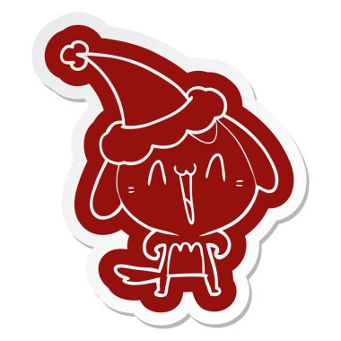 Noel Baba şapkası giyen bir köpek sevimli ilginç çizgi etiket