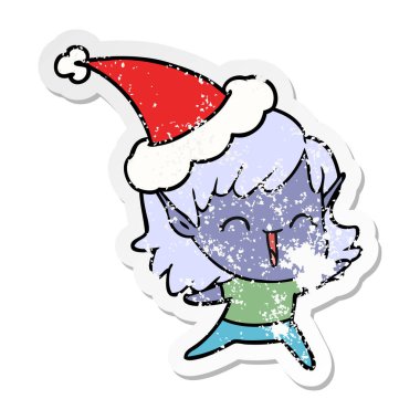 Noel Baba şapkası giyen bir elf kızın sıkıntılı etiket karikatür el çekilmiş
