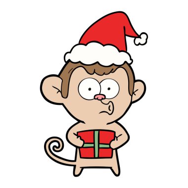 Noel Baba şapkası giyen Noel maymun çizim için el çekilmiş