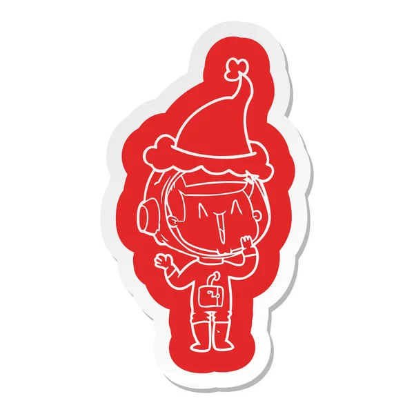 Sticker dessin animé riant d'un astronaute portant un chapeau de Père Noël — Image vectorielle