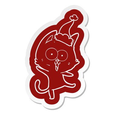 Noel Baba şapkası giyen bir kedinin komik ilginç karikatür simgesi