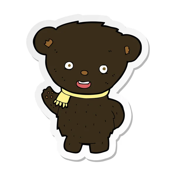 Adesivo di un cartone animato orso nero agitando — Vettoriale Stock