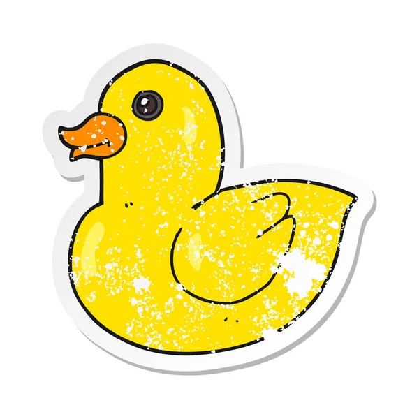 Retro distressed sticker of a cartoon rubber duck — Stock Vector