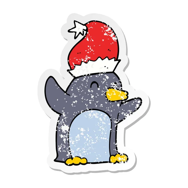 Distressed sticker of a cute cartoon christmas penguin — Stock Vector