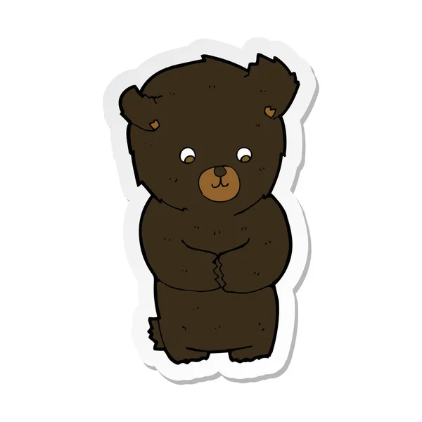 Pegatina de un lindo oso negro de dibujos animados — Archivo Imágenes Vectoriales