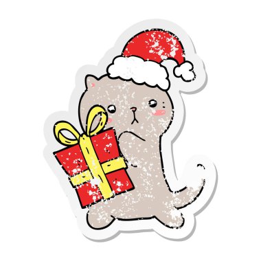 Noel pres taşıyan bir sevimli çizgi kedi sıkıntılı etiket