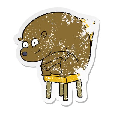 sandalyede oturan bir karikatür ayının sıkıntılı etiket