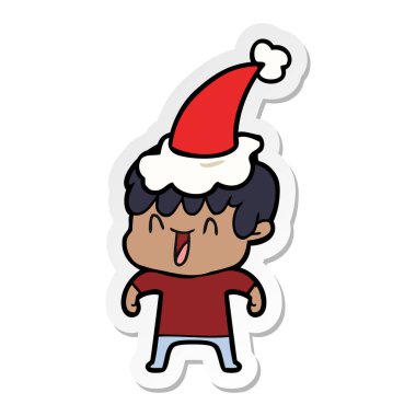 etiket karikatür Noel Baba şapkası giyen bir gülen çocuk el çekilmiş