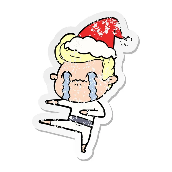 Adesivo angosciato cartone animato di un uomo che piange indossando cappello di Babbo Natale — Vettoriale Stock