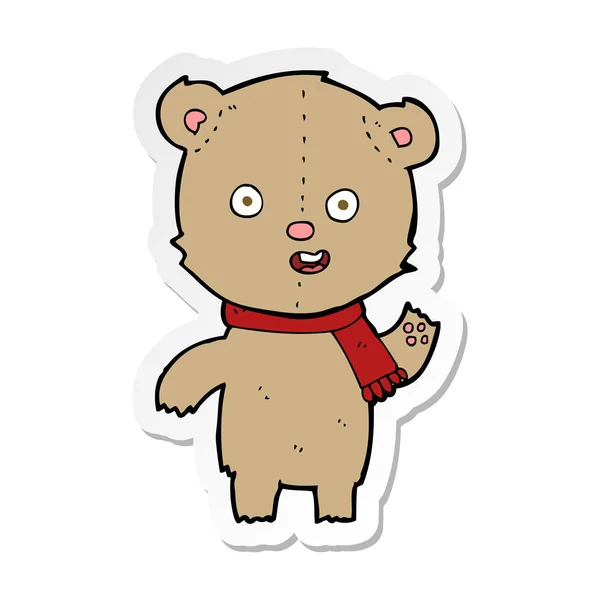 Pegatina de un oso de peluche ondeante de dibujos animados con bufanda — Vector de stock