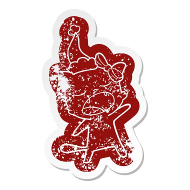 Noel Baba şapkası giyen bir şarkı kedinin ilginç karikatür sıkıntılı etiket