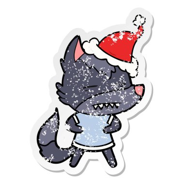 sıkıntılı etiket karikatür Noel Baba şapkası giyen diş gösterilen kurt el çekilmiş
