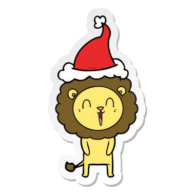 Aslan gülerek el etiket karikatür giyen Noel Baba şapkası, çekilmiş