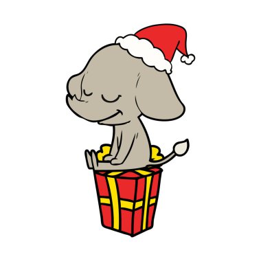 çizim için Noel Baba şapkası giyen gülümseyen bir filin el çekilmiş