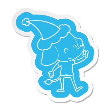 Noel Baba şapkası giyen bir filin sevimli ilginç çizgi etiket