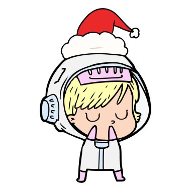 Noel Baba şapkası giyen bir astronot kadının çizgi çizme