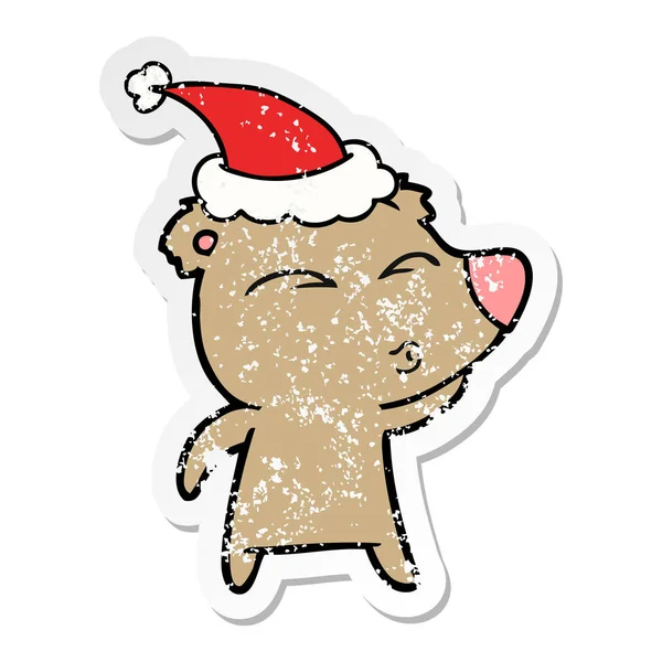 Handgezeichneter Aufkleber Karikatur Eines Pfeifenden Bären Mit Weihnachtsmütze — Stockvektor