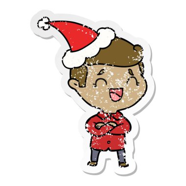 Noel Baba şapkası giyen bir gülen adam sıkıntılı etiket karikatür el çekilmiş