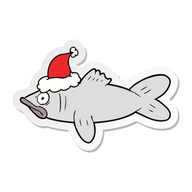 etiket karikatür Noel Baba şapkası giyen bir balık el çekilmiş