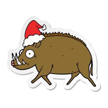 Noel Baba şapkası giyen bir yaban domuzu etiket karikatür el çekilmiş