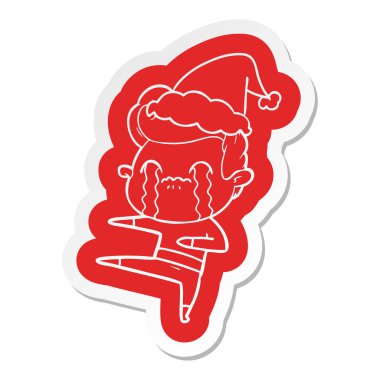 ilginç çizgi film etiketi giyen Noel Baba şapkası ağlayan bir adam