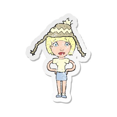 Retro etiket kış şapka giymiş bir karikatür kadının sıkıntılı