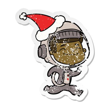 mutlu Noel Baba ha giyen bir astronotun etiket karikatür sıkıntılı