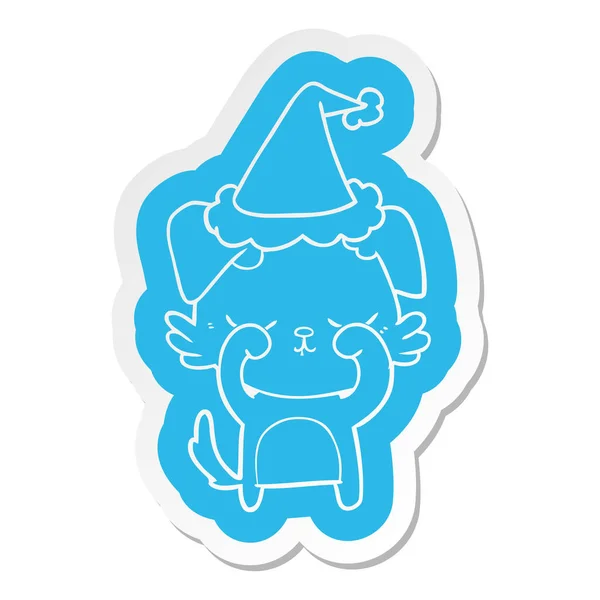 Sticker dessin animé mignon d'un chien portant un chapeau de Père Noël — Image vectorielle