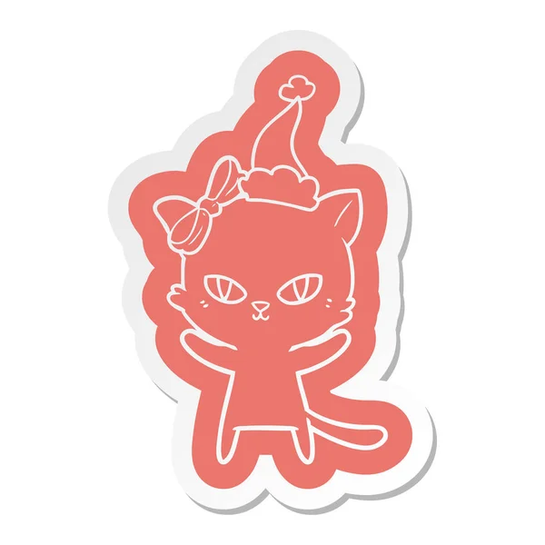 Noel Baba şapkası giyen bir kedi sevimli çizgi etiket — Stok Vektör